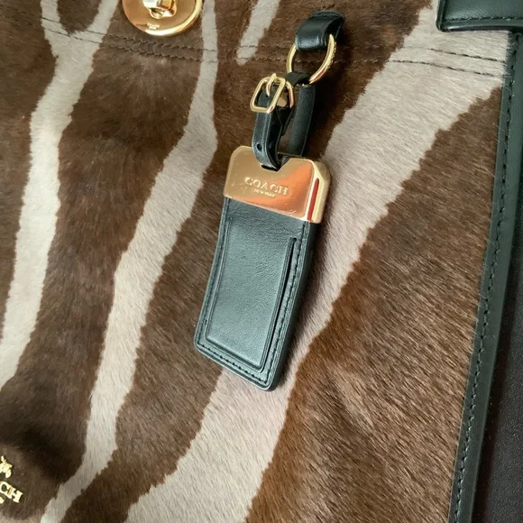 Coach,calf hair and leather top handle
Bag - Picture 11 of 14